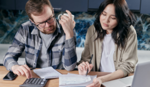 Couple looking at bills